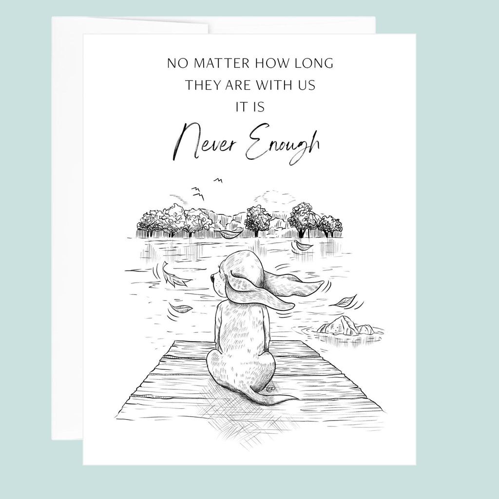 Greeting card with a black and white dog sitting on a dock illustration and text on a light blue background.