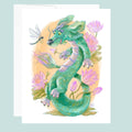 Colorful dragon illustration with lotus flowers and a dragon fly friend for year of the dragon on a light blue background.