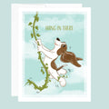 Cartoon dog climbing a vine with 'Hang in there' text on a light blue background. 