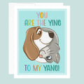 Card with cartoon dog and cat illustration and text on a light blue background. ©Good Dharma Design by Zoe Ranucci