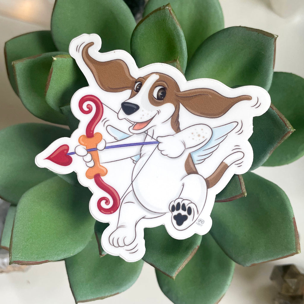 Cartoon cupid dog with a bow and arrow on a succulent plant