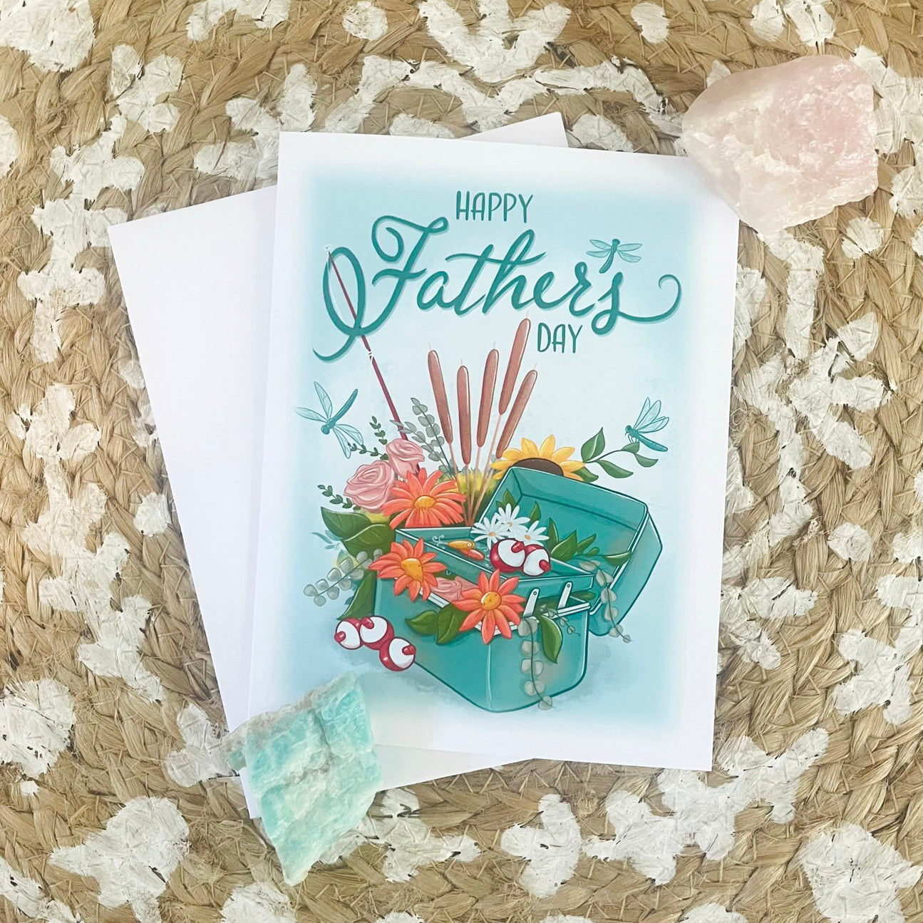 Father's Day card with floral design on a textured surface.