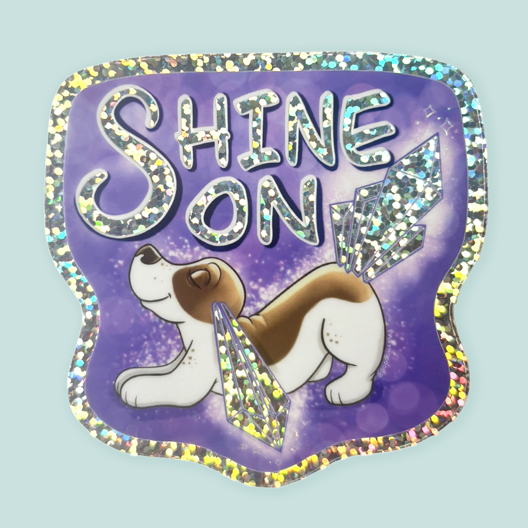 Arwork of a basset hound with crystals for ears and tail with words saying Shine On.
