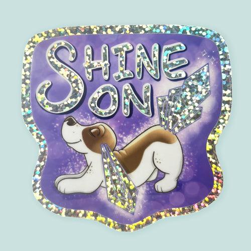 Arwork of a basset hound with crystals for ears and tail with words saying Shine On.