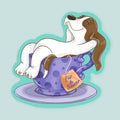 Artwork of a basset hound lounging in a purple tea cup.