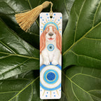 Bookmark with a dog illustration on a green leaf background