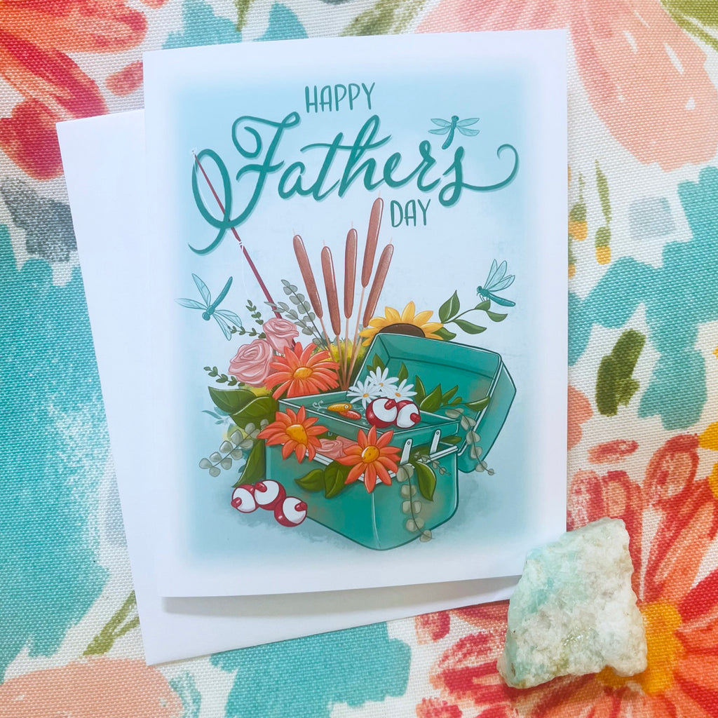 Father's Day card with floral design on a colorful fabric background.